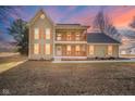 Charming two-story home with a welcoming front porch and beautiful architectural details at 4981 E County Road 200 S, Avon, IN 46123
