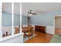 Inviting dining room with a classic wooden table, chairs, and a stylish sideboard, perfect for Gathering gatherings and dinner parties at 6907 Buick Dr, Indianapolis, IN 46214