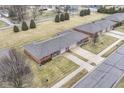 Aerial view of the townhouses showing their layout and surroundings at 120 Saratoga Way, Anderson, IN 46013