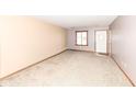 Bright and spacious living room with neutral walls and carpet at 120 Saratoga Way, Anderson, IN 46013