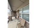 Inviting front porch with comfortable seating and view of the neighborhood at 1986 Mccormick Dr, Greenwood, IN 46143