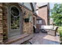Inviting front porch with comfortable seating, perfect for relaxing outdoors at 219 Buckingham Dr, Indianapolis, IN 46208