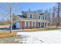 Attractive two-story home with a convenient attached garage and a covered front porch at 3492 S 600 W, Anderson, IN 46011