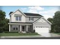 Charming two-story home with a two-car garage, a combination of light gray and white siding, and a nicely landscaped front yard at 7161 Jackson Dr, Cumberland, IN 46229