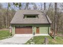Charming home with a garage and inviting deck, nestled in a beautiful, wooded area at 1032 E Woodall Ct, Martinsville, IN 46151