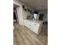 Bright kitchen showcasing a white island with granite countertops, ample storage, and modern appliances at 1130 W State Road 42, Mooresville, IN 46158