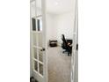 Bright office space featuring neutral carpet and a comfortable office chair at 1456 Bigleaf Dr, Sheridan, IN 46069