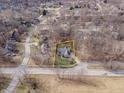 Overhead view showing a home's position in a quiet residential area near a main road at 15921 Herriman Blvd, Noblesville, IN 46060