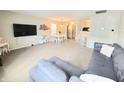Bright open concept living room and dining area, perfect for entertaining guests or spending time with Gathering at 10921 Walnut Grv, Camby, IN 46113
