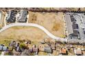 Wide aerial view of a vacant lot situated on a curved street near residential areas at 1148 Easy St # A, Greenwood, IN 46142