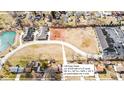 Aerial view of a large lot for sale, subdividable into four units, near a pond at 1148 Easy St # A, Greenwood, IN 46142