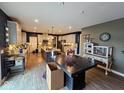 Spacious kitchen with stainless steel appliances, granite countertops and an island perfect for entertaining at 12889 Girvan Way, Fishers, IN 46037