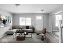 Bright and airy living room with a large sofa and modern decor at 6205 Beech Grove Rd, Martinsville, IN 46151