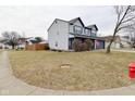 A cozy two-story home featuring a well-manicured lawn and neighborhood surroundings at 6619 Captiva Pass, Plainfield, IN 46168