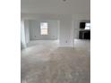 Spacious living room with neutral walls and natural light, ideal for entertaining at 7622 Sebastian Pl, Indianapolis, IN 46239
