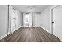 Bright living room with modern wood flooring and a lot of natural light at 1130 E Bradbury Ave, Indianapolis, IN 46203