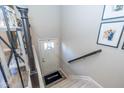 Bright entryway with a stairway, a 'Welcome' mat, and framed Gathering photos at 1208 Chapman Dr, Westfield, IN 46074