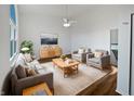 Bright living room features a neutral color palette, modern furniture, and hardwood floors, creating a warm and inviting space at 1492 Michigan Rd, Franklin, IN 46131