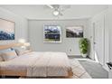 Cozy main bedroom features soft carpet, modern furniture, and tranquil decor for a restful night's sleep at 1492 Michigan Rd, Franklin, IN 46131