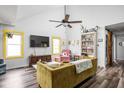 Bright living room with vaulted ceilings, stylish furniture, and modern decor at 2224 E Pleasant Run Parkway North Dr, Indianapolis, IN 46203