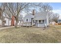 Exterior view of a single Gathering home with blue siding and a ramp leading to the front porch at 2420 Sheffield Ave, Anderson, IN 46011