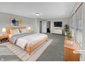Spacious main bedroom with ensuite bathroom and ample closet space at 4140 Congaree Dr, Indianapolis, IN 46235