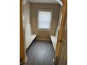 Hallway nook with bench seating, offering a cozy and functional space at 721 N Grant Ave, Indianapolis, IN 46201