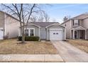 Cozy single-Gathering home with a one-car garage, neat landscaping, and a welcoming facade at 14344 Cuppola Dr, Noblesville, IN 46060
