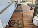 Accessible front porch with a ramp, offering convenience and easy access to the home at 1437 E Pleasant Run Pkwy S Dr, Indianapolis, IN 46203