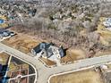 Aerial view of an upscale community featuring large, newly built homes at 580 Exmoor Dr, Carmel, IN 46032