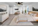 Serene main bedroom with neutral decor, ample natural light, and a cozy atmosphere at 6457 Flag Stop Dr, Whitestown, IN 46075