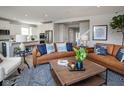 Cozy living room featuring a large sofas, stylish decor, and an open floor plan at 7348 Deerberg Dr, Indianapolis, IN 46259