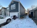 View of home with a large two-car garage, a well-kept yard, and a new-looking exterior at 9613 W Stargazer Dr, Pendleton, IN 46064