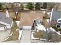 Aerial shot of a brick single-Gathering home showing the backyard and surrounding neighborhood at 10120 Youngwood Ln, Fishers, IN 46038