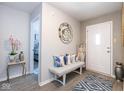 Inviting entryway featuring stylish decor, comfortable seating, and a bright, welcoming atmosphere at 13414 Allegiance Dr, Fishers, IN 46037