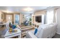 Bright living room featuring neutral tones and cozy seating, perfect for a relaxing and inviting atmosphere at 13414 Allegiance Dr, Fishers, IN 46037