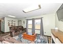 Inviting living room with lots of natural light, comfortable sofa, and stylish decor at 22569 State Road 37 N, Noblesville, IN 46060