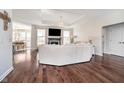 Bright living room features hardwood floors, a fireplace, and an open floor plan at 6459 Canak Dr, Avon, IN 46123