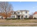 Beautiful two-story home with classic architecture and a well-maintained lawn at 10264 Normandy Way, Fishers, IN 46040