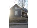 A charming home with unique architectural details and a welcoming front porch at 416 Ketcham St, Indianapolis, IN 46222