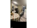 Modest kitchen with matching appliances, a neutral color palette, and a dining area at 416 Ketcham St, Indianapolis, IN 46222
