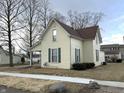 Two-story house with a covered porch and well-maintained yard, offering a blend of charm and comfort at 804 N Jameson St, Lebanon, IN 46052