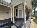 Inviting front porch showing the house number, offering a cozy spot to relax at 1153 Villa Ave, Indianapolis, IN 46203
