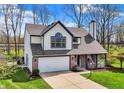 Charming two-story home with a well-maintained lawn, attached garage, and welcoming front porch at 17420 Dalton Ct, Noblesville, IN 46062