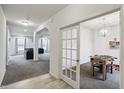 Inviting entryway with a view of the living room and a doorway to a game room at 2091 Creek Bank Dr, Columbus, IN 47201