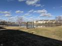 Expansive backyard featuring a serene pond view, perfect for relaxation and outdoor activities at 8360 S Evening Dr, Pendleton, IN 46064