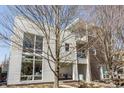 Modern home exterior with large windows and inviting architectural design at 932 N Broadway St # 1, Indianapolis, IN 46202