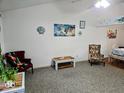 Spacious living room with lots of natural light and comfortable seating at 11521 Coastal Dr, Indianapolis, IN 46229