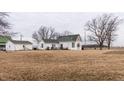 Charming home and outbuilding, surrounded by a large open yard, offers ample space at 3615 E State Rd 32, Lebanon, IN 46052