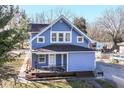 Attractive two-story home with classic architectural details and a cozy front porch at 59 E Troy Ave, Indianapolis, IN 46225